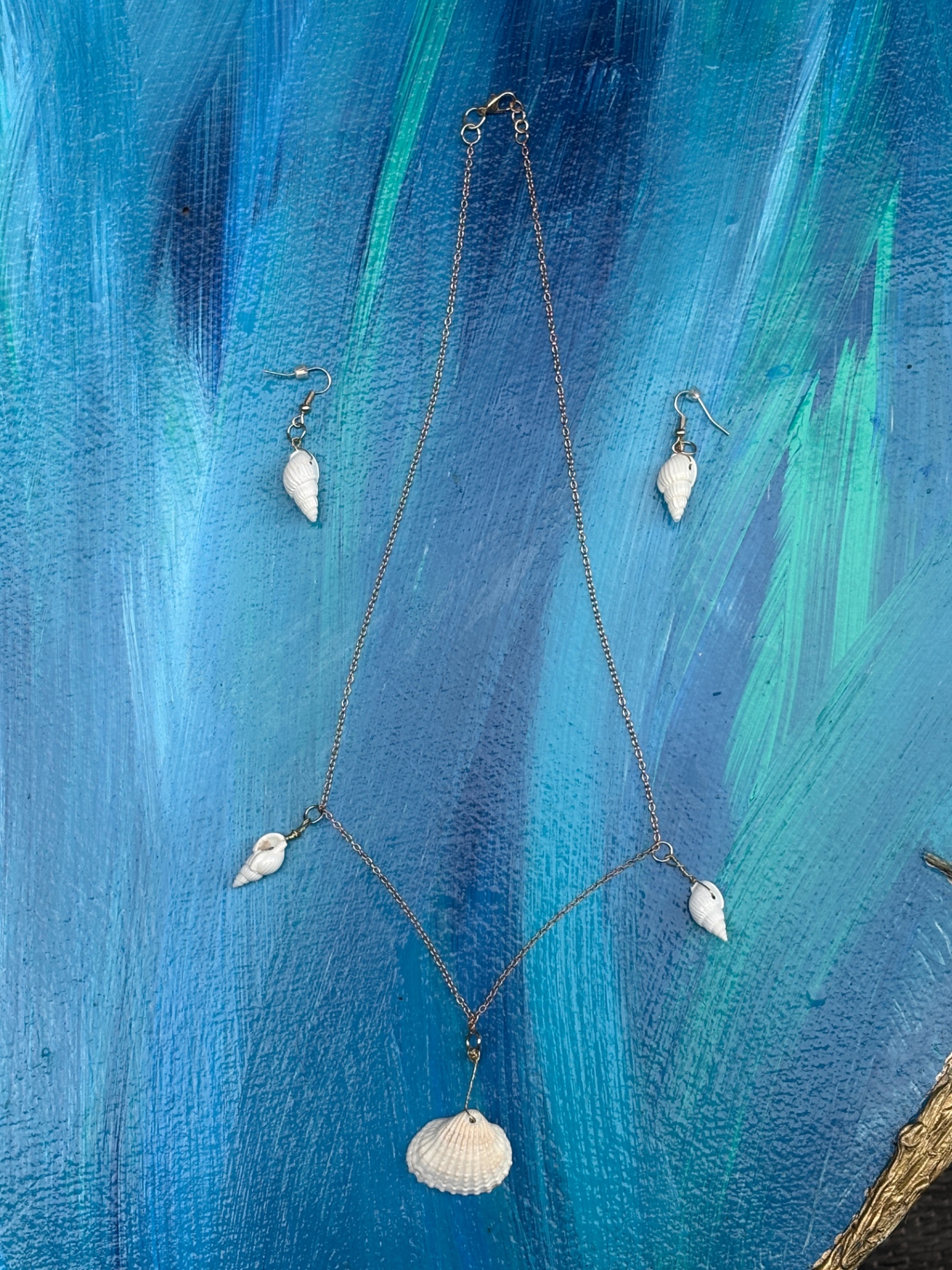 Five-shell siren necklace with matching spiral earrings